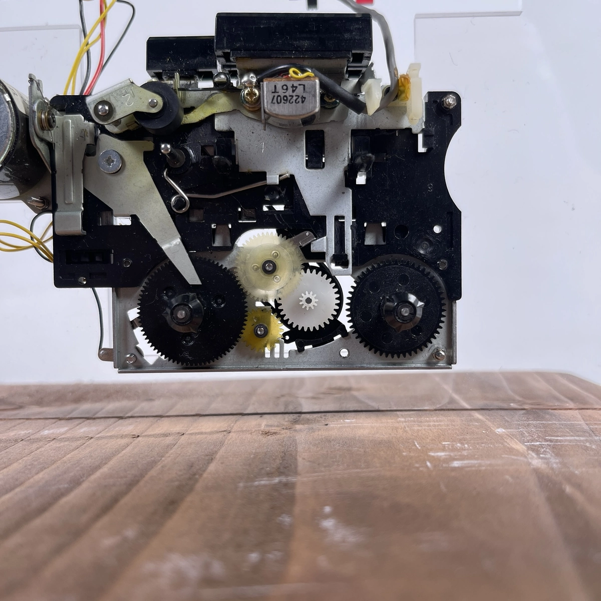Gear train and tape mechanism